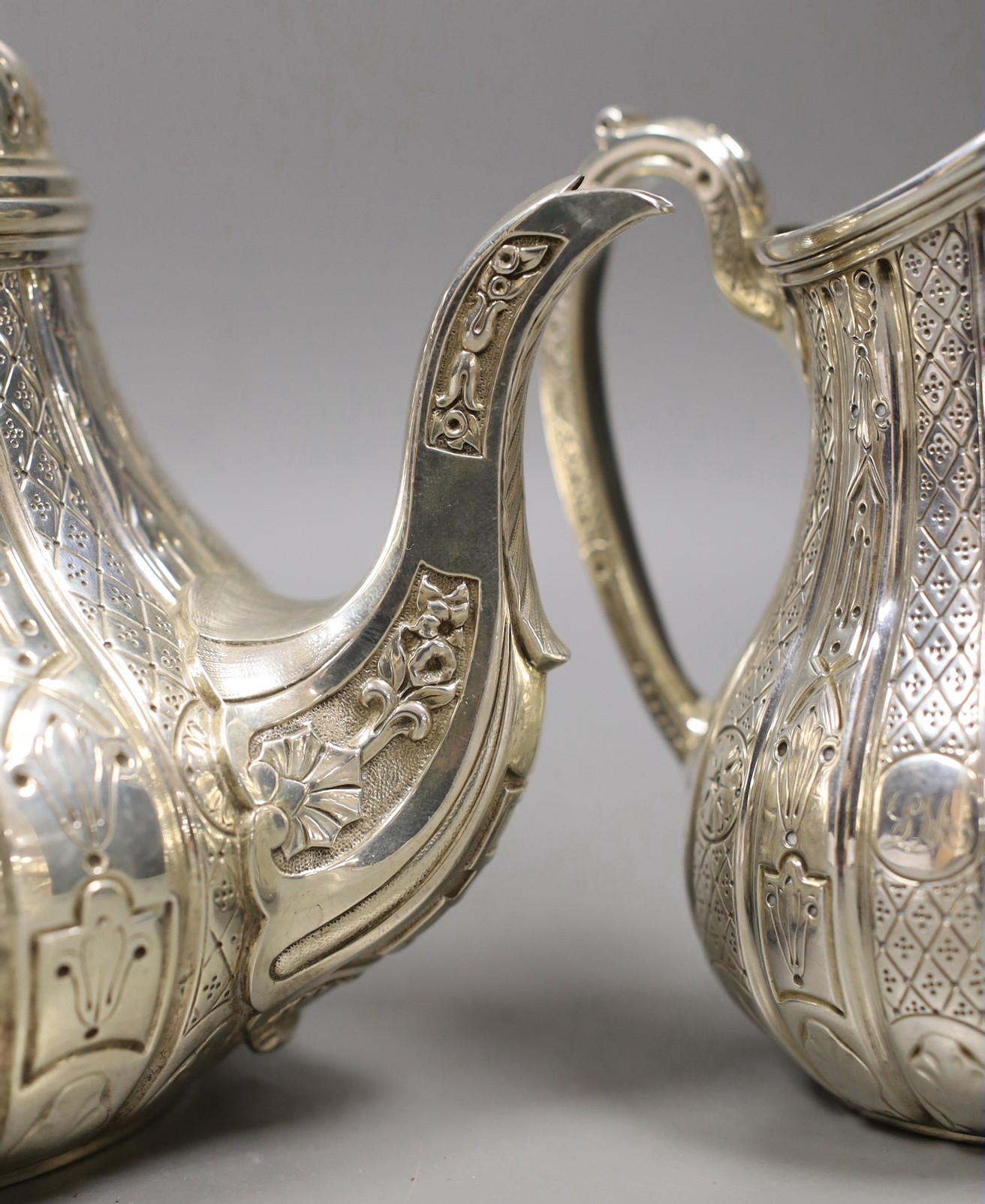 A Victorian engraved silver three piece tea set, of pear shape, by John Samuel Hunt (Hunt & Roskell late Storr & Mortimer), London, 1855/6, gross weight 45.4oz, together with original catalogue and purchase receipt, date